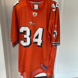 Orange Ricky Williams Miami Dolphins jersey size large color, orange gently used